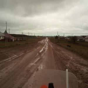 The dirt road starts in the village of Гайны